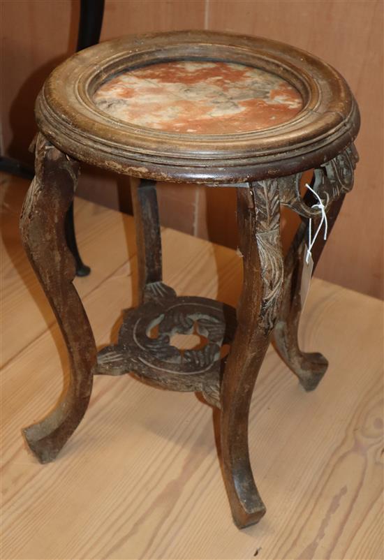 A Chinese marble topped jardiniere stand 35cm diameter